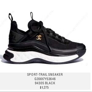 Chanel black sport trailer sneaker. With box, dust bag,& original shoe laces